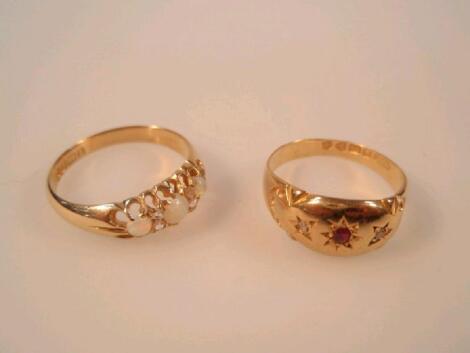 An 18ct gold stone set ring