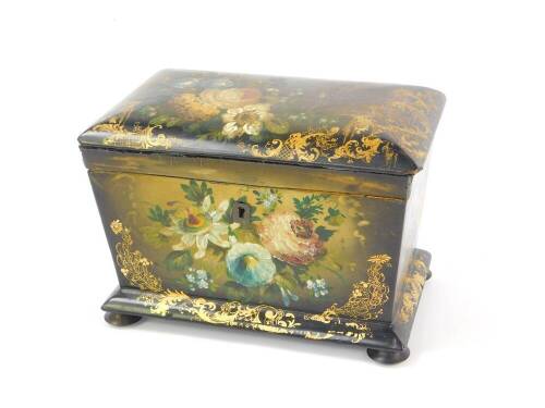 A Victorian papier mache tea caddy, Manner of Jennins & Bettridge, of twin division sarcophagus form painted with flowers to the front sides and lid, gilt foliate heightened, raised on bun feet, 14cm H, 20cm W, 12cm D.