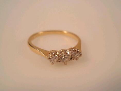 A three stone diamond ring