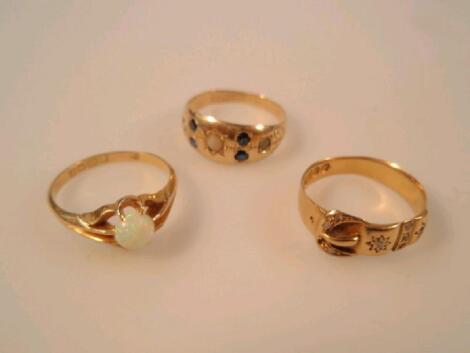 Two 18ct and one 15ct gold stone set rings