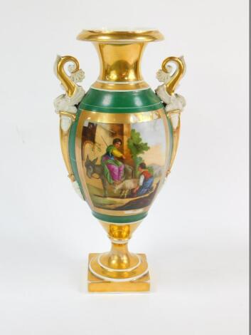 A 19thC Paris porcelain vase, of baluster form with twin sea serpent handles, reserve painted with a pastoral scene of a woman seated on an ass, and a woman with a goat, against a green ground, 30cm H.