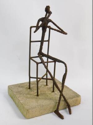 Andrew Thompson (British, 20thC/21stC). A wrought iron sculpture of the Hypochondriac, modelled as a figure seated in a chair, raised on a square concrete base, 40cm H, 25cm W.