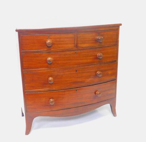 A Georgian mahogany bow front chest, of two short over three long graduated drawers, raised on splayed feet, 103.5cm H, 106cm W, 92cm D.