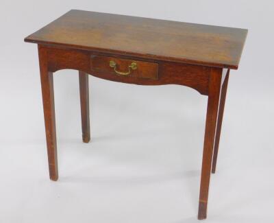 An early Georgian oak side table, with single frieze drawer, raised on chamfered square legs, 67cm High, 78.5cm WIde, 42cm Deep.