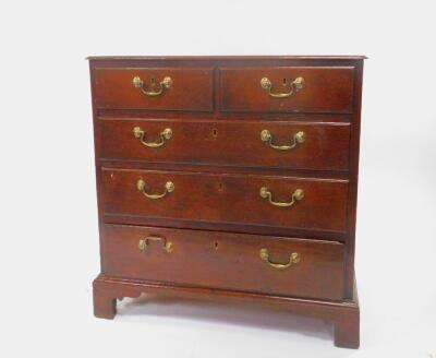 A George II oak chest, of two short over three long drawers, raised on bracket feet, 88cm High, 86cm Wide, 51cm Deep. - 2