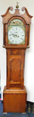 A George III oak and mahogany long case clock, the break arch dial painted with a horse race and floral spandrels, with Roman numerals, subsidiary seconds dial and date aperture, two train 8-Day movement with bell strike, the case with swan pediment and b