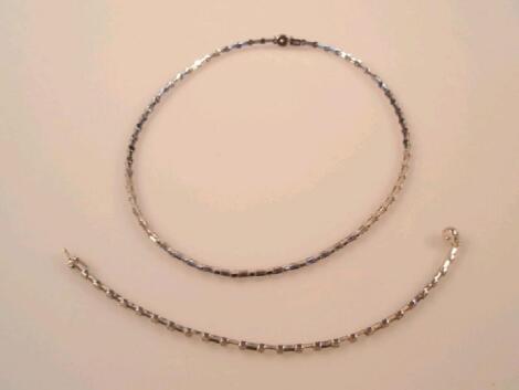 A necklace of baguette cut sapphires