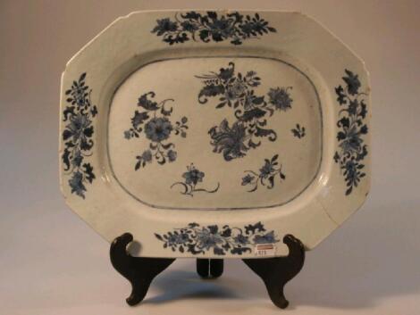 An 18thC Chinese meat plate with canted corners floral sprays in blue and