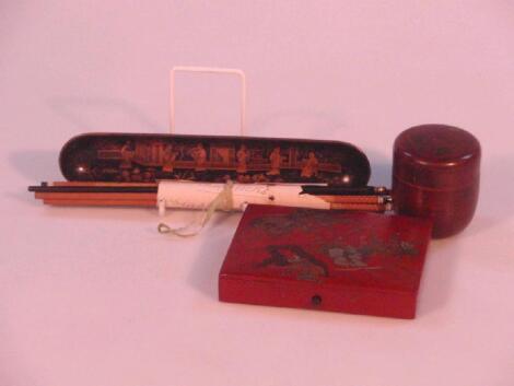 An early 20thC red Japanned box