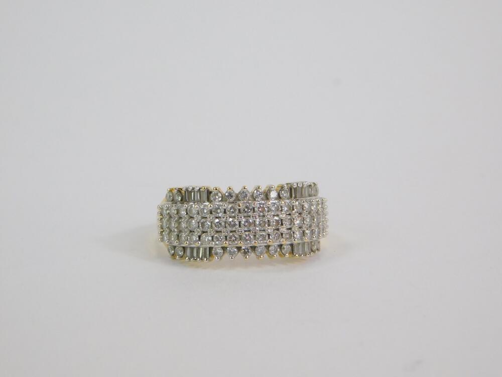 An 18ct gold and diamond banded Tomas Rae ring 1ct size N O