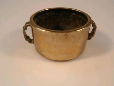 A Chinese bronze two-handled bowl