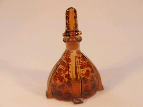 An early 20thC amber glass scent bottle and stopper