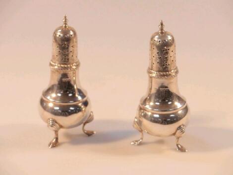A pair of small George VI silver sugar castors
