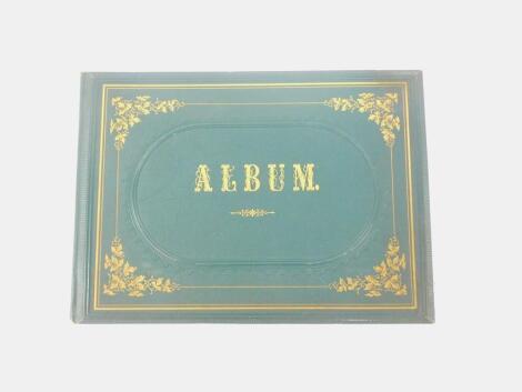 A Victorian album, in green cloth with gilt decoration, containing a collection of botanical pressed specimens of flowers and grasses, etc., in formal arrangement numbered and with annotated Latin names, bears a stamp mark to first page inscribed Alpen-P