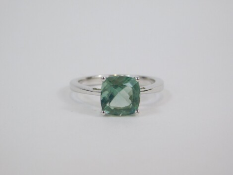 A silver and Tucson green fluorite ring, the cushion shaped stone in a claw setting, 2.48ct, size L/M, 2.39g, with certificate.