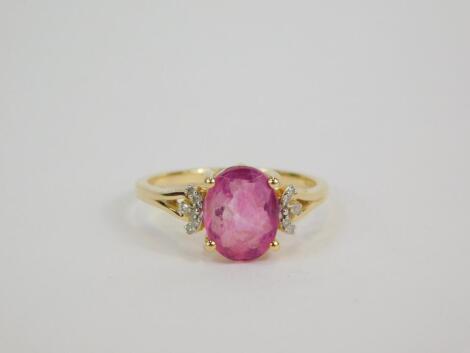 A 9ct gold pink fluorite and diamond ring, claw set, size L/M, 1.72g gold, with certificate.