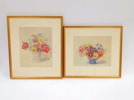 English School (Mid 20thC). Still life of pansies in a vase, still life of mixed flowers in a vase, pair of watercolours, one dated May 1936, 22cm x 27.5cm, 28.5cm x 23cm respectively. (2)