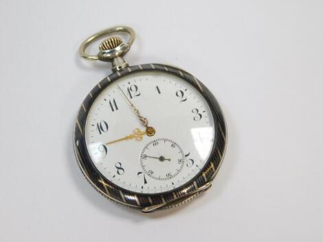 A gentleman's niello and silver cased pocket watch, open faced, keyless wind, circular enamel dial bearing Arabic numerals, subsidiary seconds dial, stamped 800.