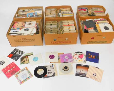 An extensive collection of 45rpm single records, rock, pop, punk, etc. (6 boxes)