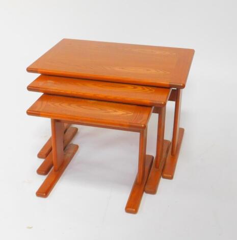 A 1970's G-Plan teak nest of occasional tables, largest 45cm H, 67cm W, 45.5cm D.