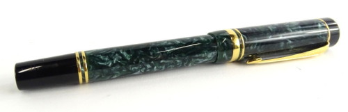 A Parker Duofold fountain pen, with green simulated marble effect and black, silver plated bands, the nib stamped 18K 750.