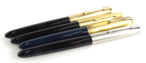 Four Parker 61 fountain pens, three in black, one navy, the navy example with blue enamel to the clip.