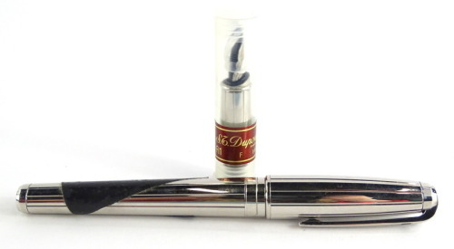 An S.T. Dupont plated fountain pen, with blackened end, the nib stamped 18k 750, and an extra nib, etc. (2).