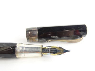 A Montegrappa simulated grey and black marble fountain pen, with silvered coloured clip, maker's name engraved to the broad collar, the nib stamped 750 and with gilt Greek key embellishment. - 2