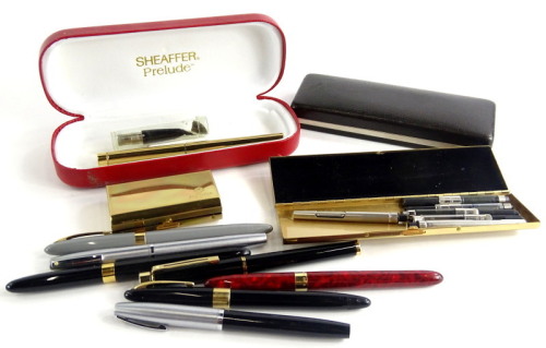 A collection of Sheaffer fountain pens, accessories, etc.