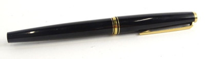 A Montblanc No. 22 fountain pen, in black with gold plated mounts, the nib stamped 585.