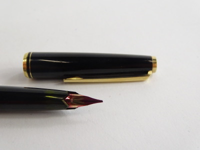 A Montblanc No. 22 fountain pen, in black with gold plated mounts, the nib stamped 585. - 3