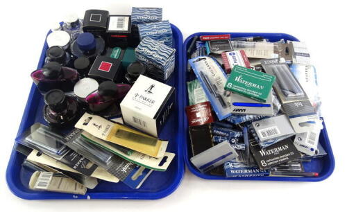 A large quantity of fountain pen ink, ink pots to include pots of coloured inks, cartridges, refills for biros etc.