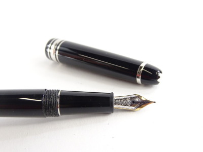 A Montblanc black and silver fountain pen, the nib stamped 585, personalised initials to cap. - 2