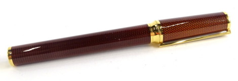 A St Dupont Laque De Chine fountain pen, with simulated gilt and bronze coloured lacquer decoration, gilt mounts, the nib stamped 18ct.