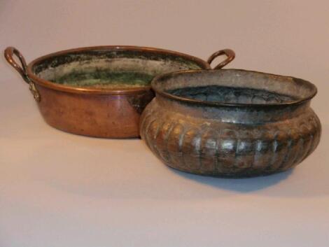 A Victorian copper two handled cream pan