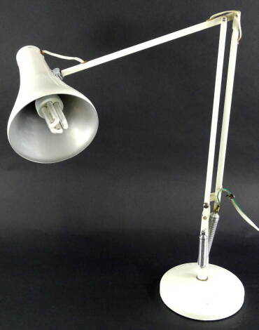 A cream enamel painted Anglepoise lamp, stamped to the base Made in England by Herbert Terry & Sons Ltd, Redditch, with a weighted base, 85cm high.