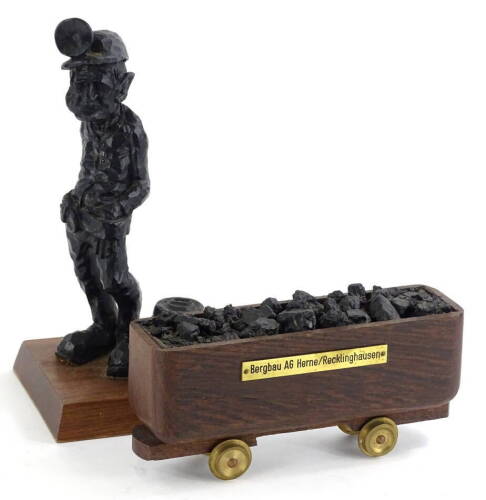 A Steve Turkovich coal craft figure of a coal miner, and a continental model of a coal truck (2).