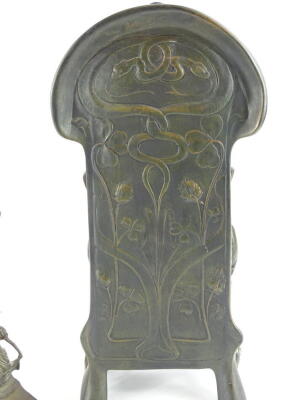 A continental mantel timepiece, the spelter case applied with figures, later German movement and a bronze resin Art Nouveau style figural mantel clock, decorated with flowers, etc., 36cm and 39cm respectively. - 2