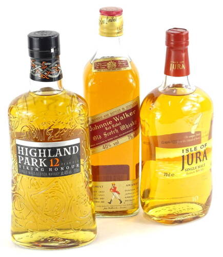 Three bottles of whisky, Highland Park, 12 years, Isle of Jura, 10 years and Johnnie Walker red label.