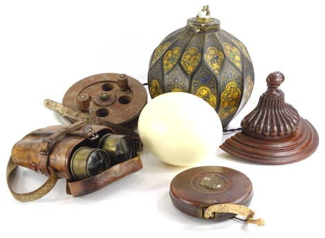 A collection of items, to include a Persian style papier mache globular table lamp, a mahogany Scarborough type fishing reel, ostrich egg, a leather Rabone tape measure, a mahogany bracket and a pair of binoculars stamped J.H. Stuart Optician, 66 The Stra