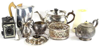 A collection of items, to include a 19thC silver plated teapot, with ebonised knop and fruitwood handle, a chamberstick with snuffer, Picquot ware hot water jug, silver plated wine coaster with mahogany base and pierced sides, box Brownie camera, bullet s