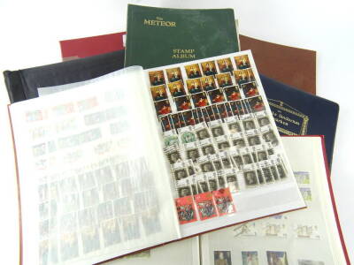 Various stamps and philately. A Scandinavian stock book, a further vacant stock book, a Meteor stamp album in green with various world used, St Helena orange back Gold Coast 1d blue back, green back, Iraq, mainly early 20thC, various GB collector's stamp