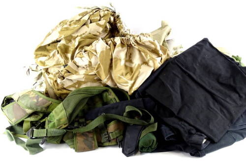 Two boxes of miscellaneous army and other camouflage uniform, and some accessories.