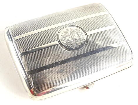 An Edwardian silver cigarette case, with engine turned decoration and central monogram, Birmingham 1902, 3½oz.