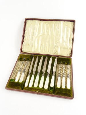 A late Victorian silver plated part dessert service, each blade engraved with flowers, leaves, etc., mounted with mother of pearl handle, comprising five forks and six knives (incomplete), in red leatherette and velvet lined box.