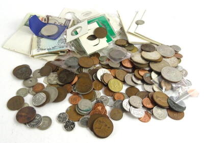 A quantity of British and foreign coins, to include a small amount of silver, various crowns, bank notes, etc.