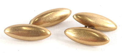 A pair of oval bullet shaped cufflinks, yellow metal, marked 10ct, 4.4g all in.