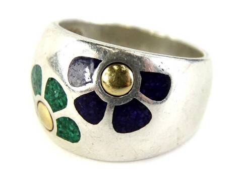 A modern silver dress ring, with design of two flowers in green and purple, with silver hallmark and maker stamp QVC, ring size S½, 13.5g all in.