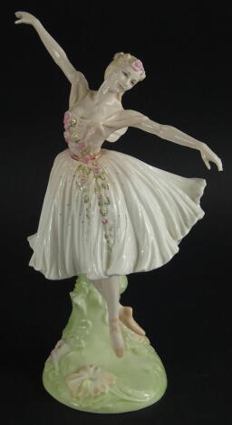 A Coalport figure Dame Antoinette Sibley, limited edition number 451/5000, printed marks beneath, 29cm high, (AF).