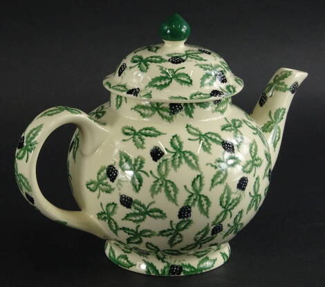 A 20thC Emma Bridgewater pottery hand decorated teapot, decorated with brambles, in red and green, printed marks beneath, 20cm high.